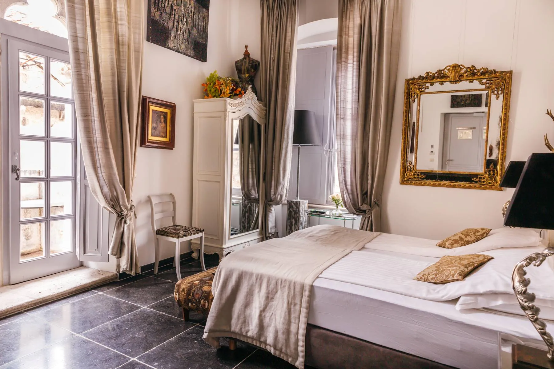 Verdoes room hotel Prijeko Palace Dubrovnik bedroom overview with unique artful design and decoration
